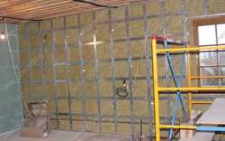 Теплоизоляция и обшивка в два слоя гипса по деревянным конструкциям.